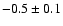 $-0.5\pm 0.1$