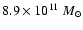 $8.9 \times 10^{11}~M_\odot$