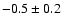 $-0.5\pm 0.2$