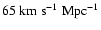 $\rm 65~km\ s^{-1}~Mpc^{-1}$