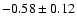 $-0.58\pm0.12$