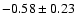 $-0.58\pm0.23$