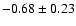 $-0.68\pm0.23$