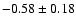 $-0.58\pm0.18$