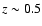 $z \sim 0.5$