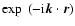 $\exp~ ( - {\rm i} \vec{k} \cdot \vec{r})$
