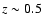 $z\sim 0.5$