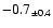 $-0.7_{\pm 0.4}$