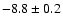 $ -8.8 \pm 0.2$