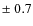 $\pm~0.7$