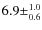 $6.9 \pm^{1.0}_{0.6}$