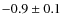 $-0.9 \pm 0.1$