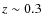 $z \sim 0.3$