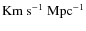 ${\rm Km~ s^{-1}~{\rm Mpc}^{-1}}$