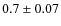 $0.7\pm0.07$