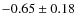 $-0.65\pm0.18$