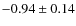 $-0.94\pm0.14$