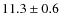 $ 11.3\pm0.6$