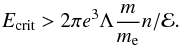 $$ E_{\rm crit} > 2 \pi e^3 \Lambda \frac m{m_{\rm e}} n / \mathcal{E}. $$