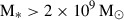 Mathematical equation: $ \mathrm{M}_* > 2 \times 10^{9}\,\mathrm{M}_{\odot} $